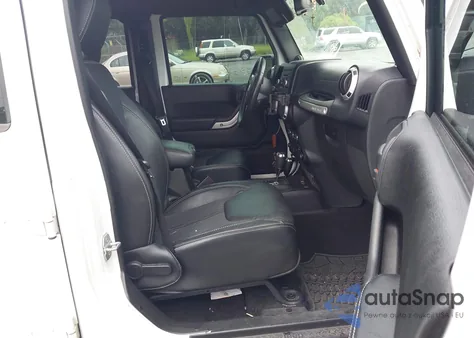 2013 Jeep Wrangler Unlimited Sport z USA, uszkodzony, nr VIN 1C4HJWDG7DL591197